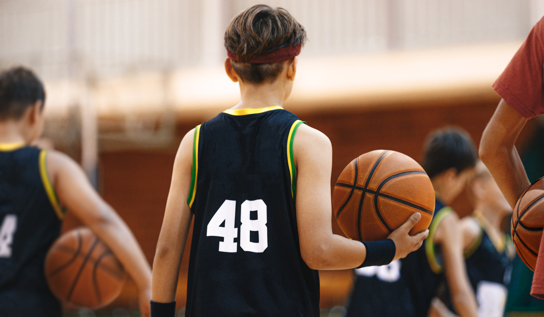 Child playing basketball